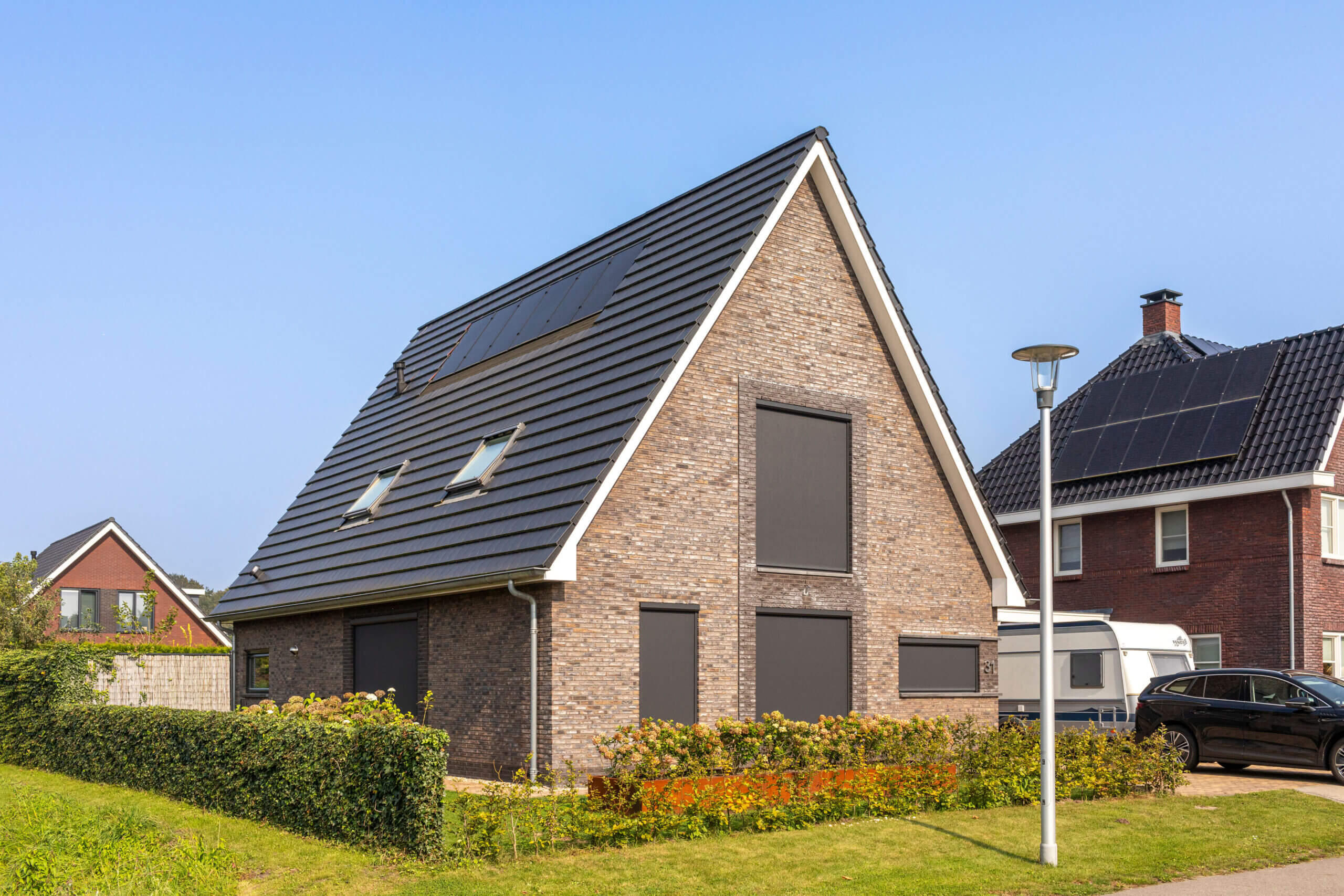 Screens donker vrijstaand huis - SunLub