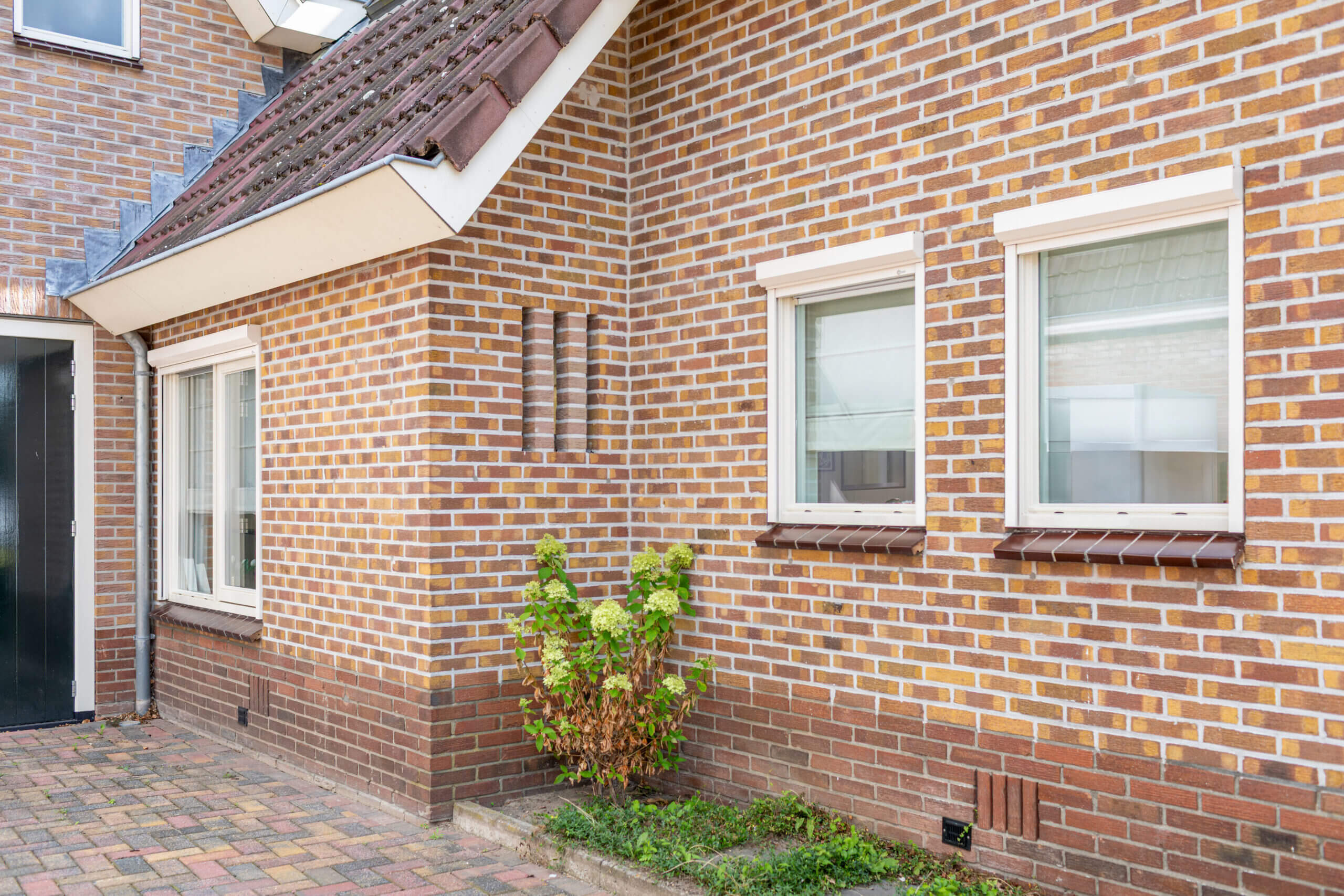 Screens open zijkant huis - SunLub